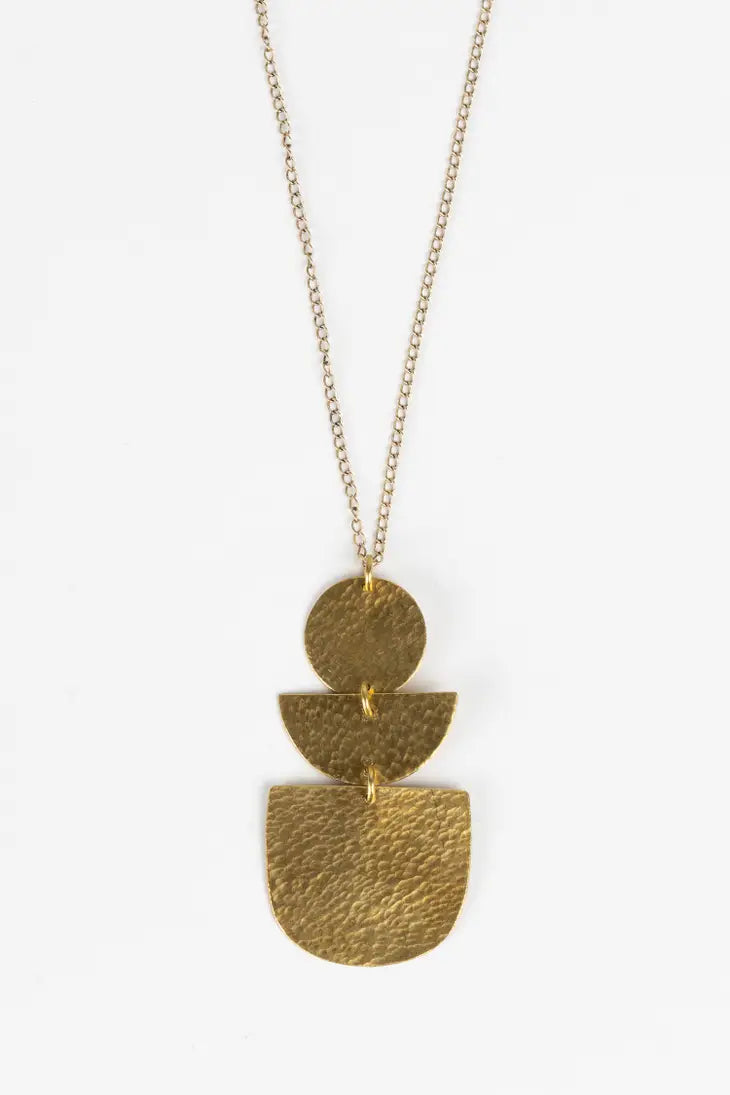 A geometric gold necklace.